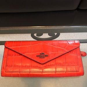 COACH orange “croc” embossed wallet, VGUC. 8”x4”.